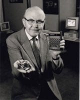 [Jack Kilby holding microchips and the first Cal-Tech calculator presented to Patrick E. Haggerty on March 29, 1967]