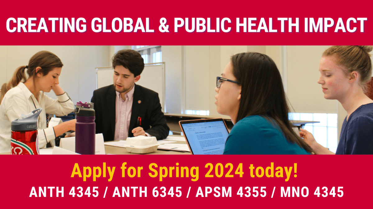 Image of four students in class. Text says: "Creating Global and Public Health Impact. Apply for Spring 2024 today! ANTH 4345/ ANTH 6345/ APSM 4355/ MNO 4345"