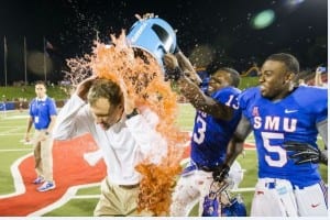 Chad Morris getting dunked by our football players!