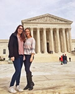 Emily and Megan stand in front of the Supreme Court.