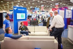 SMU students, staff, and faculty discuss ManeFrame 2 at SMU's booth at SC18.