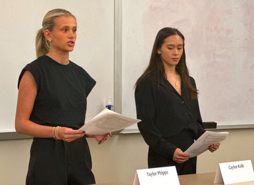 two female students present before the judges