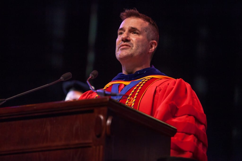 SMU Film professor Sean Griffin sings the National Anthem at the 2015 Graduation Ceremonies