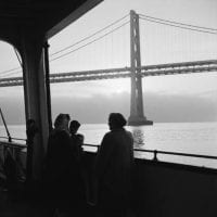 Southern Pacific Ferry passengers enjoying the view of the San Francisco Bay Bridge [No. 1], February 22, 1950, DeGolyer Library, SMU.