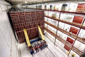 The completed NOvA far detector in Ash River, Minnesota, stands 50 feet tall, 50 feet wide and 200 feet long. The pivoting machine that was used to move each block of the detector into place now serves as the capstone on the end of the completed structure. Photo: Fermilab