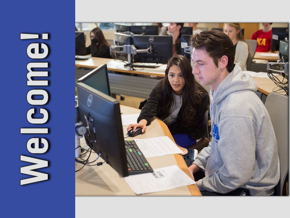 Welcome! Two students using the Bloomberg in the Kitt Center of the Business Library